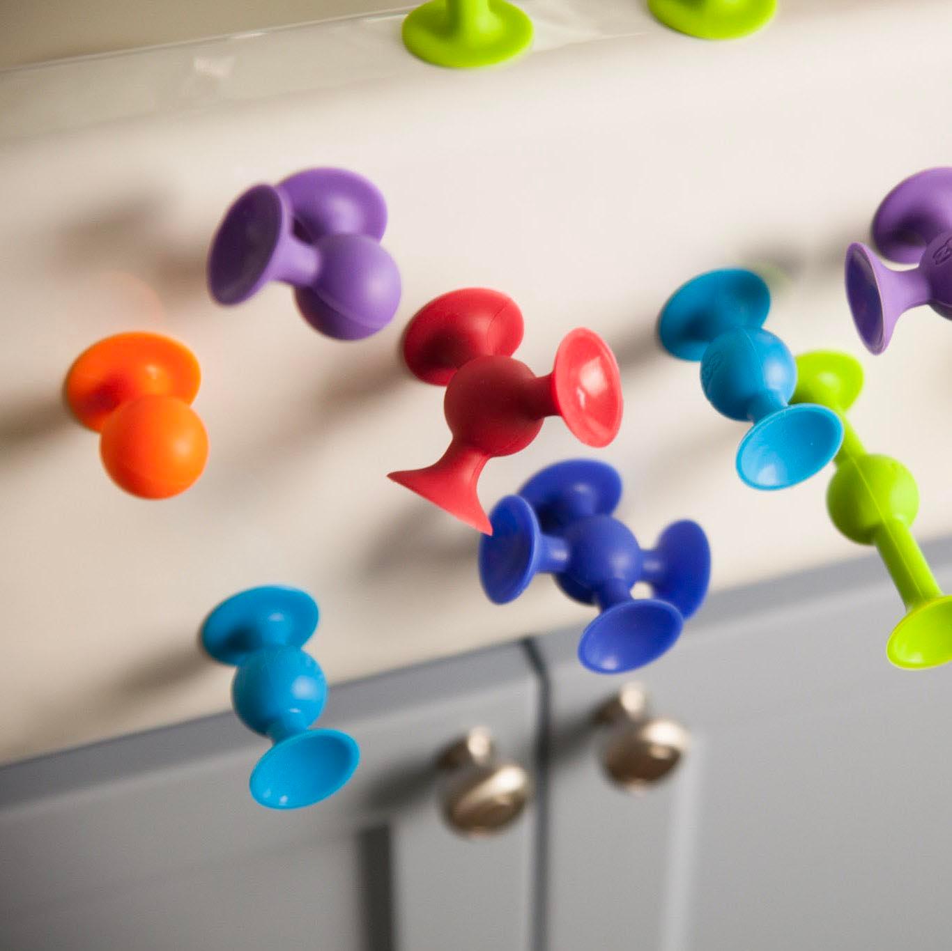 Fat Brain Toys: przyssawki Squigz Deluxe 50 el. - Noski Noski