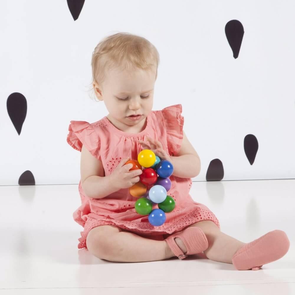 Manhattan Toy: drewniana zabawka dla niemowląt Baby Beads - Noski Noski