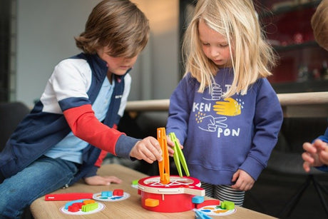 Gra zręcznościowa Bs Toys Łowimy warzywa rozwijająca sprawność manualną i logiczne myślenie, idealna dla małych rączek.