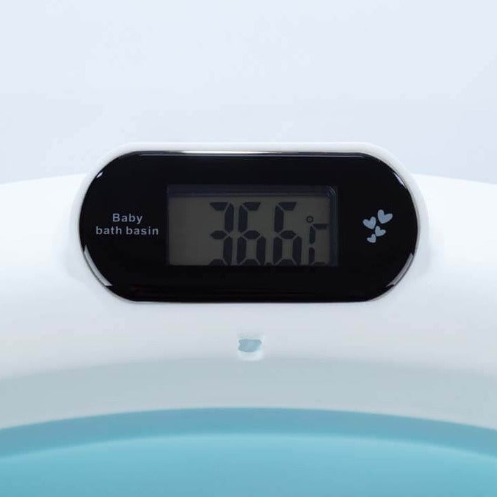 To-ma: bains repliés avec un thermomètre et un oreiller gris de bain et de  soins