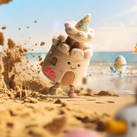 Pluszowy zamek z piasku Jellycat Amuseables Sandcastle, idealny do zabawy i przytulania, przenosi na słoneczną plażę.