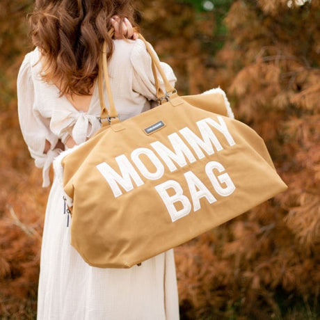 Stylowa torba do wózka Childhome Mommy Bag z licznymi przegródkami, przewijakiem i pojemną przestrzenią dla modnej mamy.