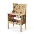 Stół warsztatowy dla dzieci z drewna, z akcesoriami, wspiera kreatywność i zdolności manualne, idealny do zabawy i nauki.