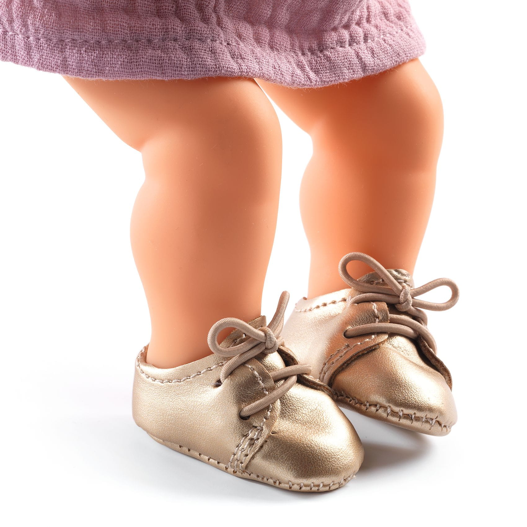 Poma: zapatos dorados para muñecas