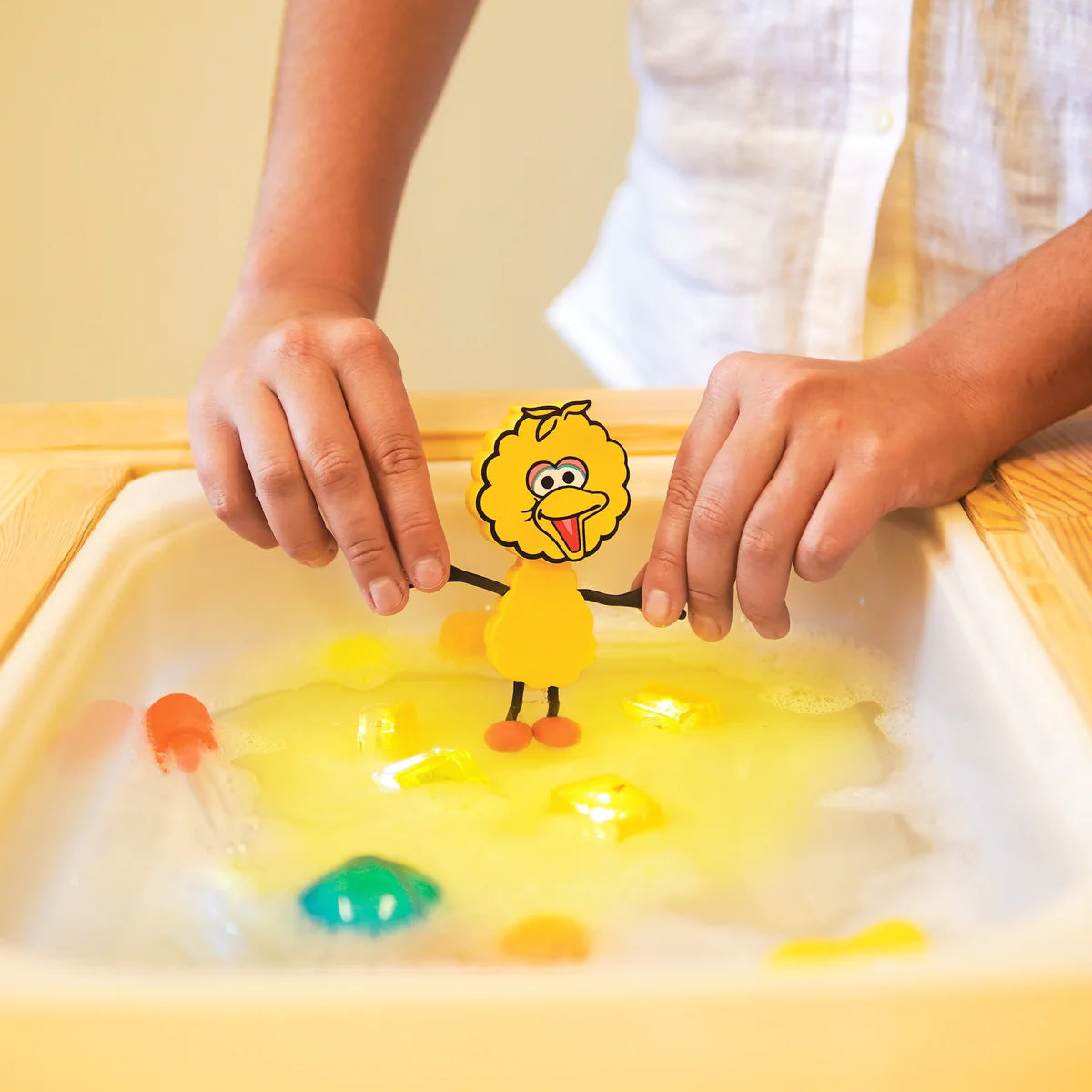 Glo Pals: A guy and glowing sensory cubes for water light-up sensors toy sesame street