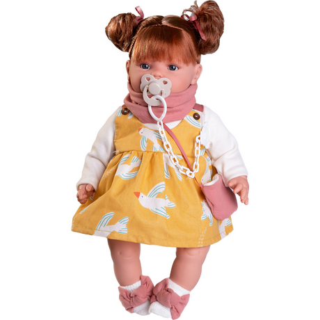 Lalka bobas Antoni Juan Beni w musztardowej sukience, idealna zabawka dla dziewczynek ceniących jakość i realizm.