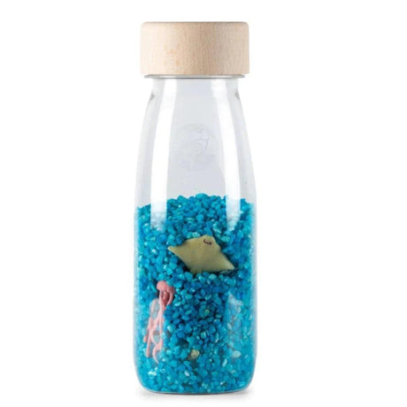 Zabawka sensoryczna Petit Boum Ocean butelka do obserwacji, idealna dla małych rączek, rozbudza wyobraźnię i ciekawość.