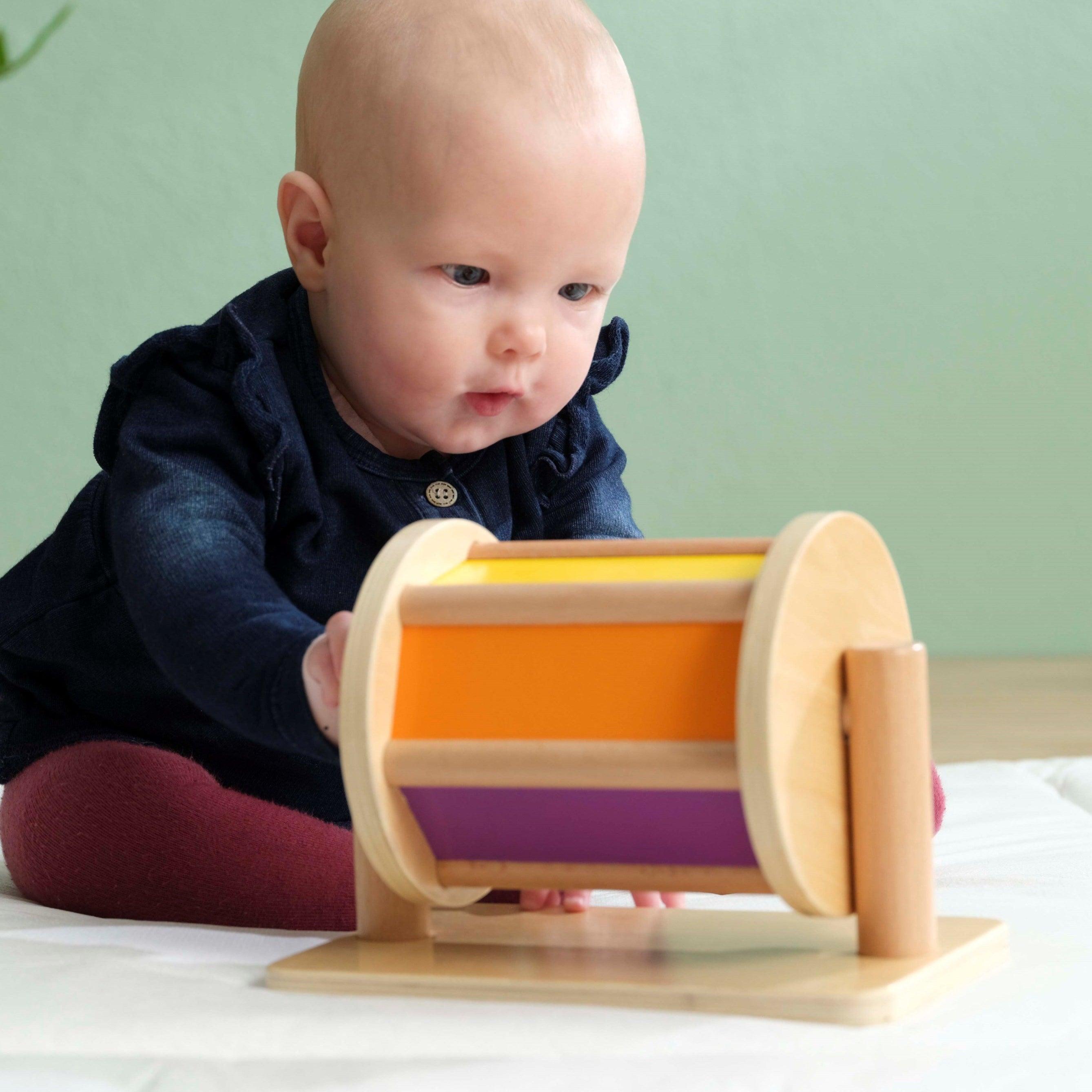 Educo: materiał dla niemowląt Spin the Drum Montessori - Noski Noski