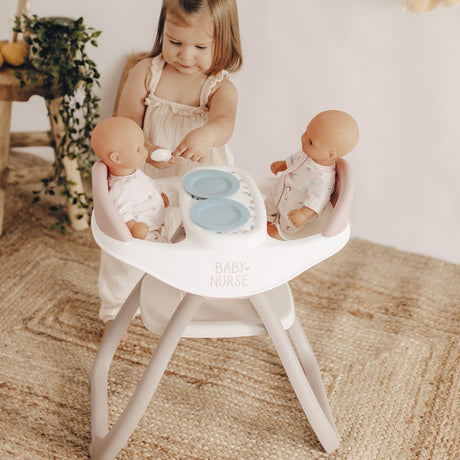 Krzesełko do karmienia dla lalek Baby Nurse Smoby dla bliźniaków, idealne dla małych opiekunek i wspólnych posiłków.