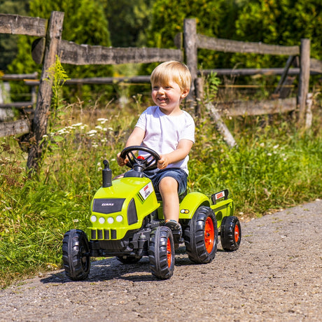 Zielony Traktor na pedały Falk Claas z przyczepą, klaksonem; idealny dla dzieci od 2 lat. Stabilny i bezpieczny.