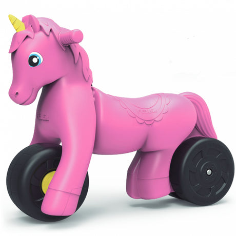 Różowy jeździk Feber Jednorożec dla dziewczynki, bezpieczny i stabilny na szerokich kołach.