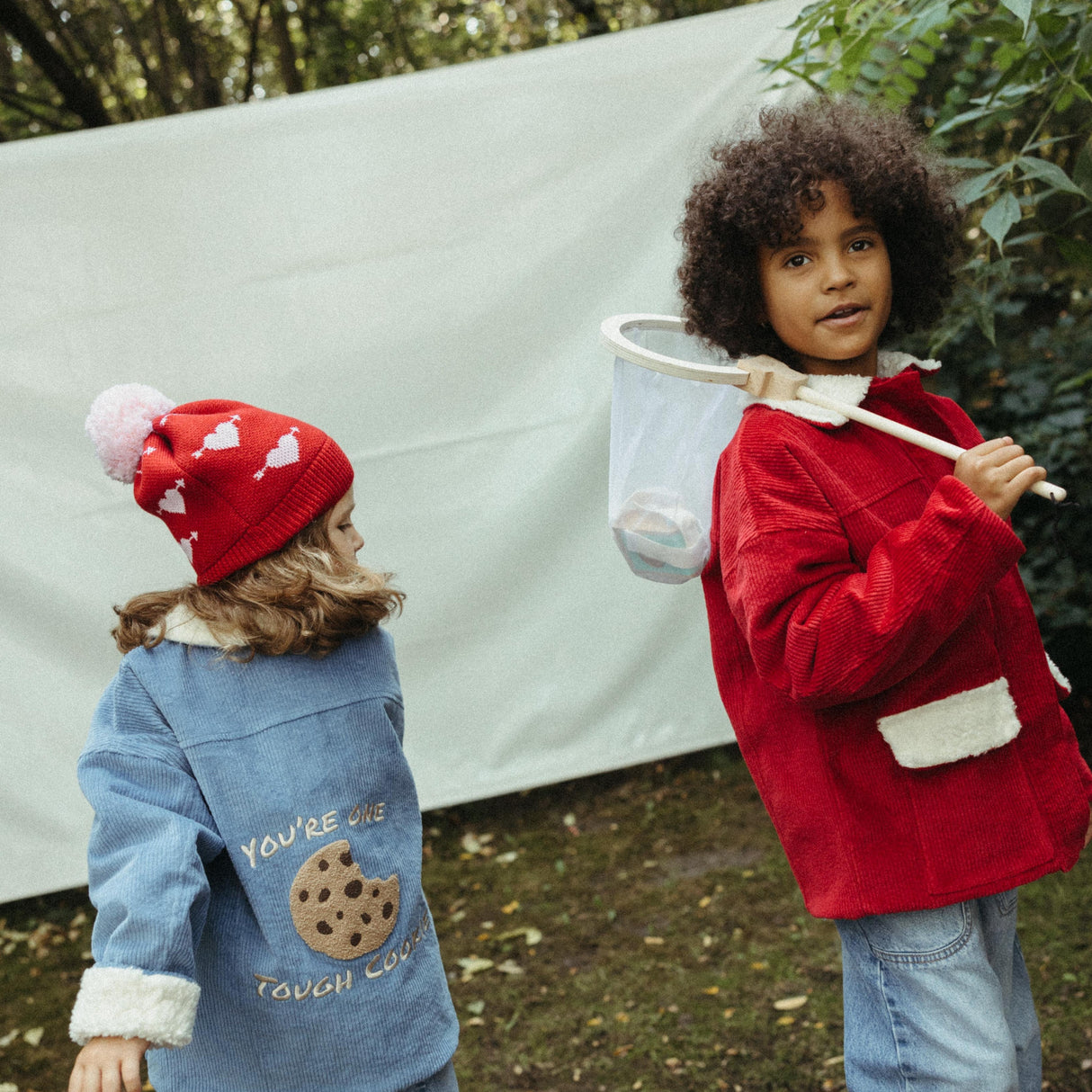 Kid Story: en peluche de fleurs rouges chaudes en peluche