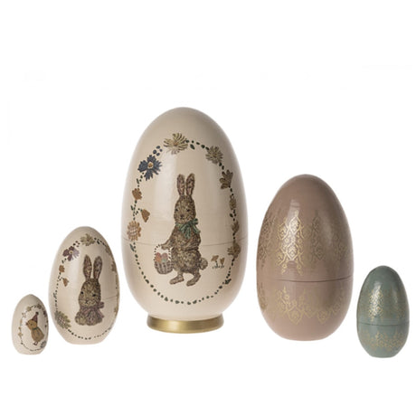 Eleganckie, ręcznie wykonywane jajka wielkanocne w stylu matrioszki, idealne jako dekoracje i ozdoby wielkanocne.