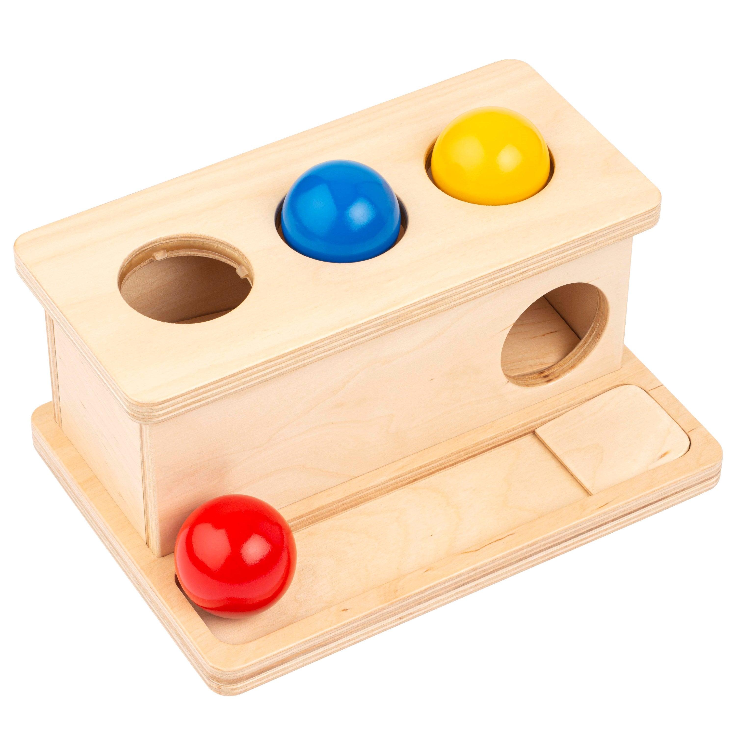Nienhuis Montessori: drewniana zabawka z kulkami Push Box - Noski Noski