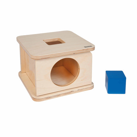 Drewniane pudełko Montessori Nienhuis Imbucare Box z kostką dla dzieci od 12 miesięcy dla rozwijania koordynacji ręka-oko.