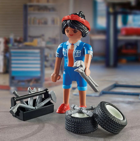 Figurka Playmobil Mechaniczki z akcesoriami: skrzynka na narzędzia, opony, zestaw narzędzi. Dla małych miłośników motoryzacji.