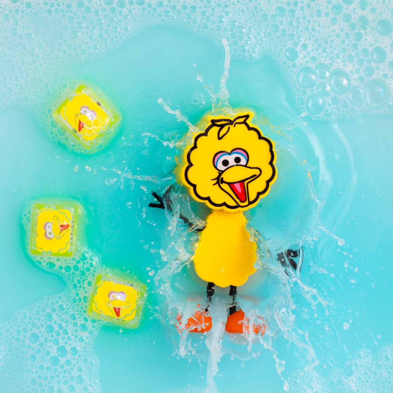 Glo Pals: ludzik i świecące sensoryczne kostki do wody Light-up Sensory Toy Sesame Street