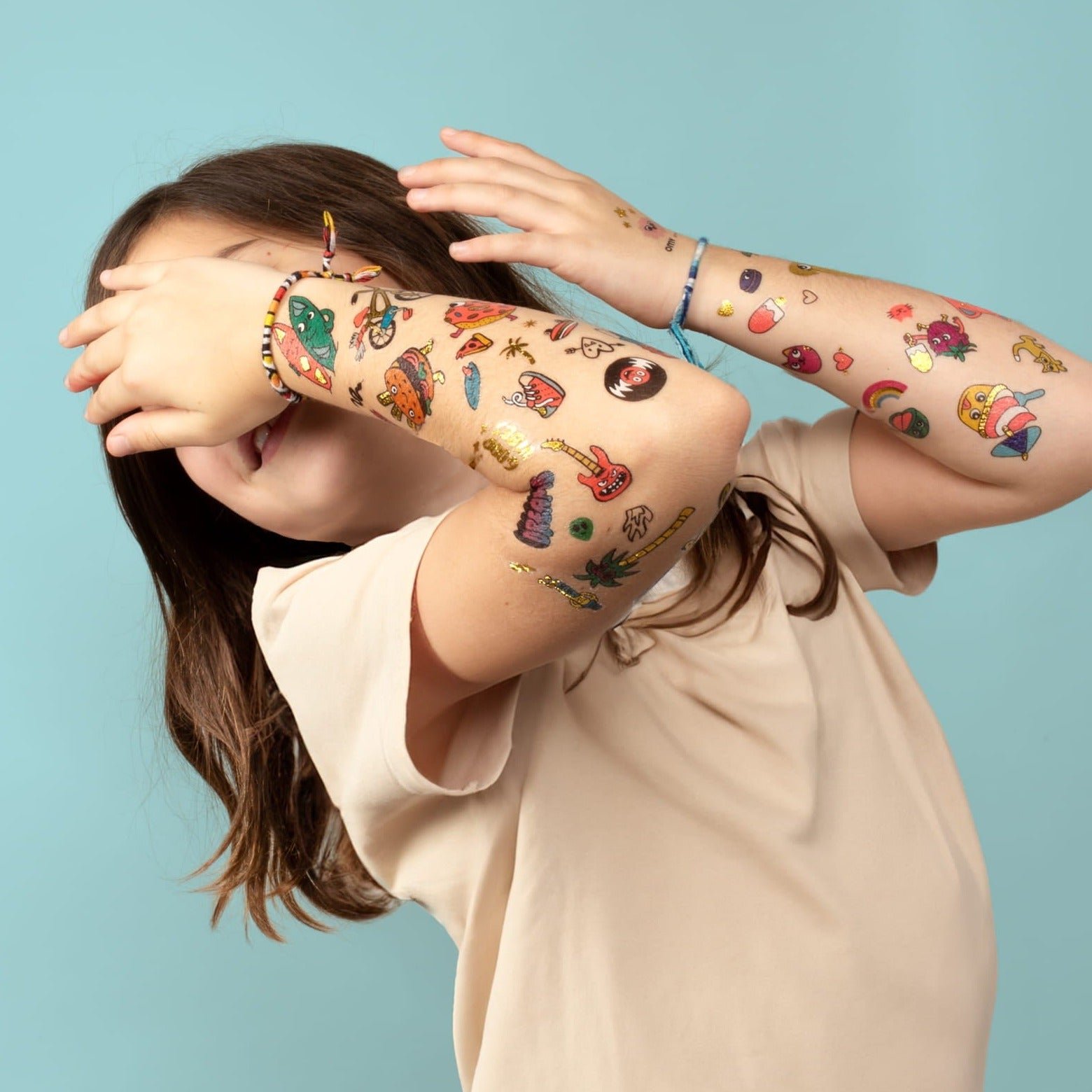 Ohms: tatuajes fluorescentes para niños 50 kawaii