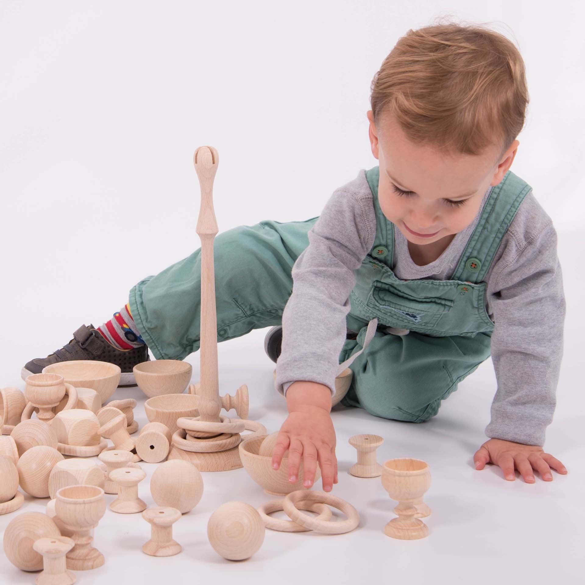 TickiT: drewniane figurki Heuristic Play Wooden Starter Set 63 el. - Noski Noski
