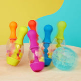 Zestaw dużych kręgli dla dzieci B.toys Let's Go Bowling, przezroczyste kręgle z kolorowymi kuleczkami.