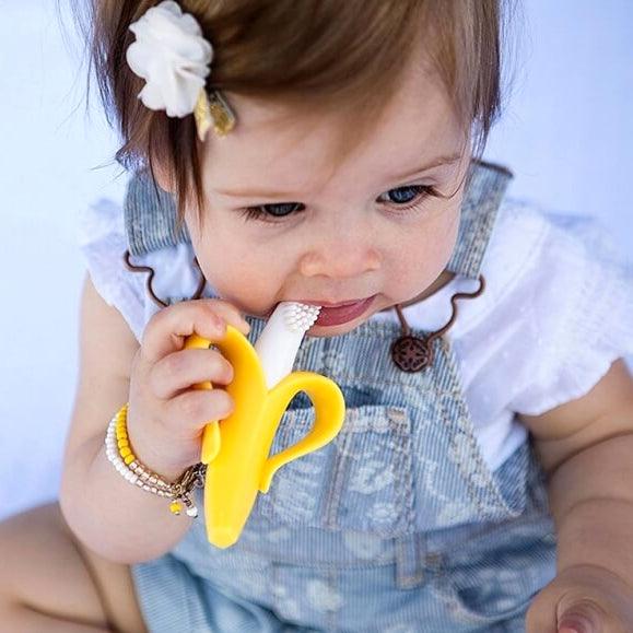 Gryzak Baby Banana Banan Yellow, silikonowa szczoteczka dla niemowląt, higiena jamy ustnej i łagodzenie bólu dziąseł.