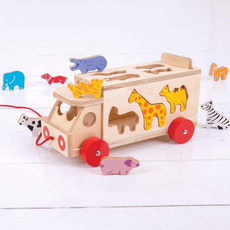 Drewniany sorter dla dzieci Bigjigs Toys Animal Shape Lorry z 10 zwierzątkami do kreatywnej zabawy.