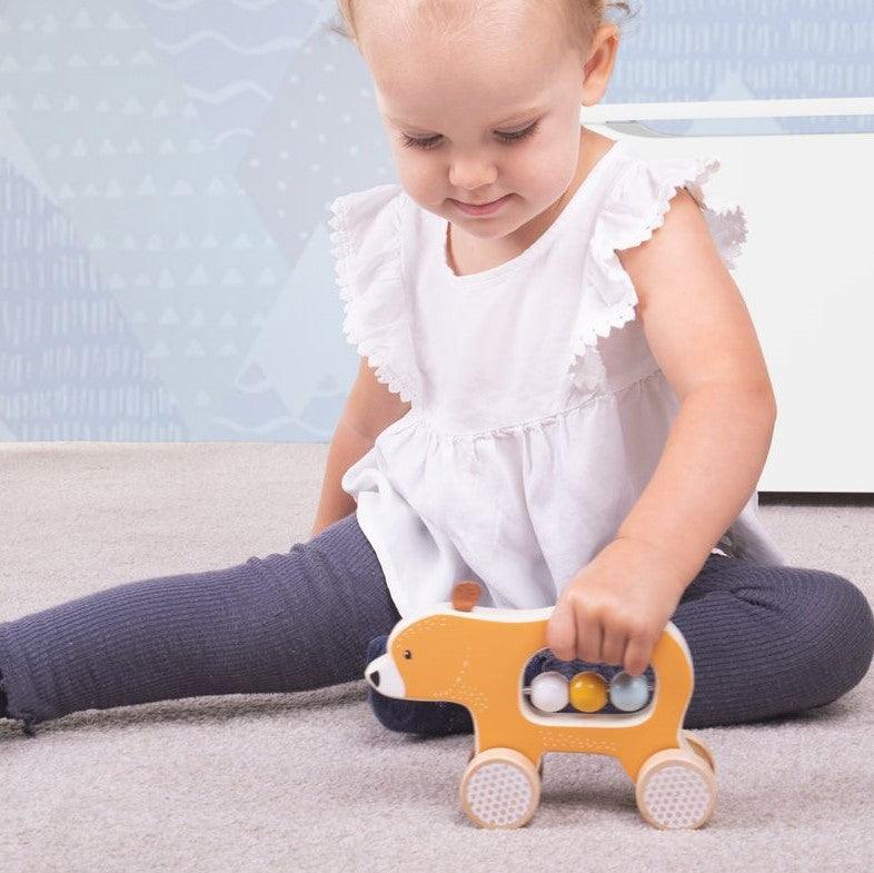 Bigjigs Toys: niedźwiadek na kółkach Push Along Bear - Noski Noski
