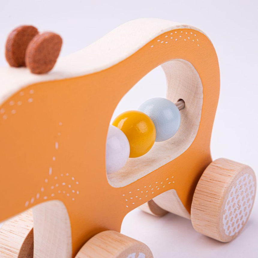 Bigjigs Toys: niedźwiadek na kółkach Push Along Bear - Noski Noski