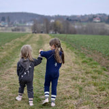 Kombinezon zimowy niemowlęcy dla dziewczynki z polaru zapewniający ciepło i wygodę, idealny na chłodne dni.