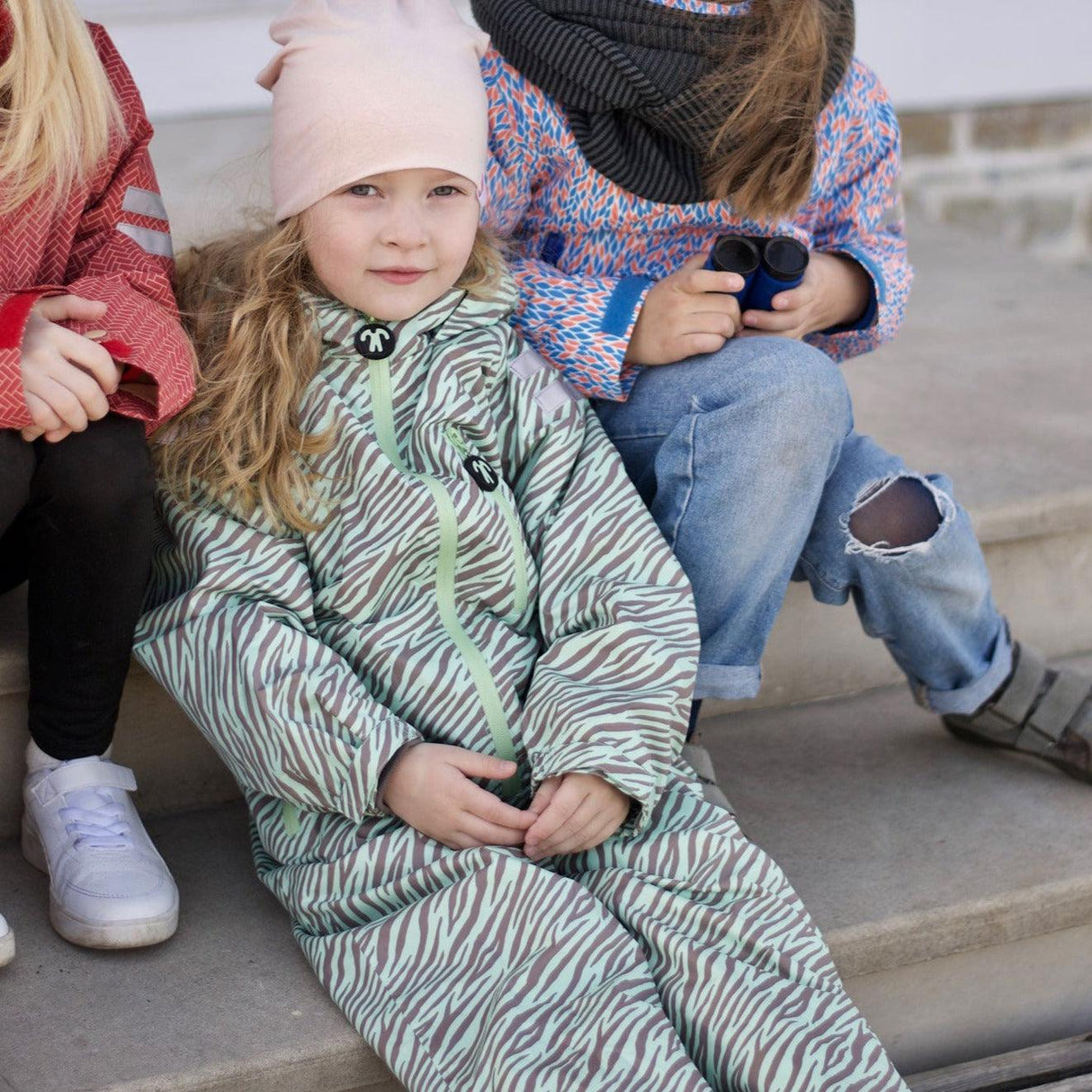 Kombinezon zimowy przeciwdeszczowy dla dzieci, Ducksday Rainsuit Recycled 98-104, wodoodporny i oddychający.