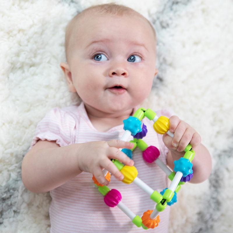 Fat Brain Toys: kostka sensoryczna dla niemowląt Quubi - Noski Noski