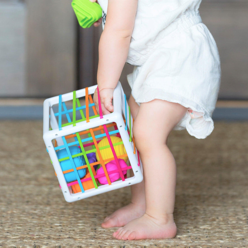 Fat Brain Toys: sorter elastyczna kostka sensoryczna InnyBin - Noski Noski