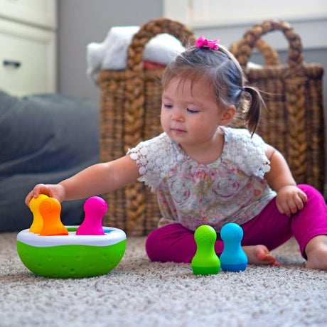 Zabawka sensoryczna i edukacyjna Fat Brain Toys SpinnyPins, kolorowy sorter dla dzieci rozwijający zdolności manualne.