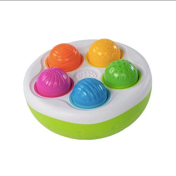 Fat Brain Toys: sorter kolorowe wańki wstańki SpinnyPins - Noski Noski
