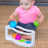Zabawka edukacyjna Fat Brain Toys RollAgain sorter kulek, kolory, grzechotki, rozwój motoryki i poznawcze umiejętności dla dzieci.