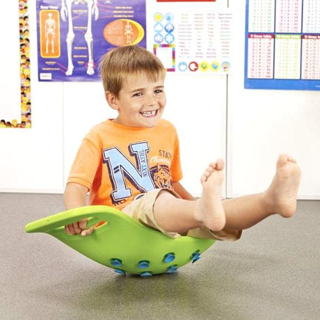 Zabawka sensoryczna Fat Brain Toys Teeter Popper, deska do balansowania, rozwija równowagę, koordynację i kreatywność dziecka.