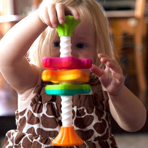 Fat Brain Toys: zakręcona zabawka dla maluchów MiniSpinny - Noski Noski