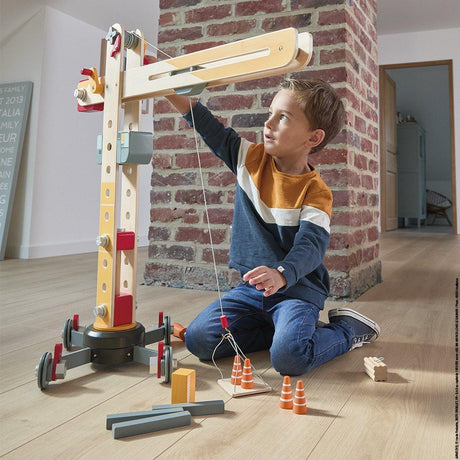 Drewniany dźwig zabawka Janod do składania, rozwija zdolności manualne i uczy cierpliwości dziecka.