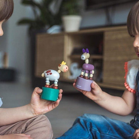 Janod: tańczące zwierzątko Pocket - Noski Noski