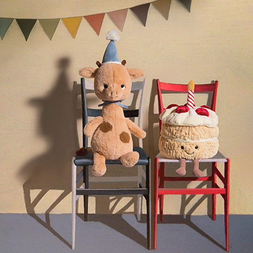 Maskotka żyrafa Jellycat Jollipop Giraffe 23 cm z czapeczką i pomponem, mięciutka przyjaciółka dla dzieci.