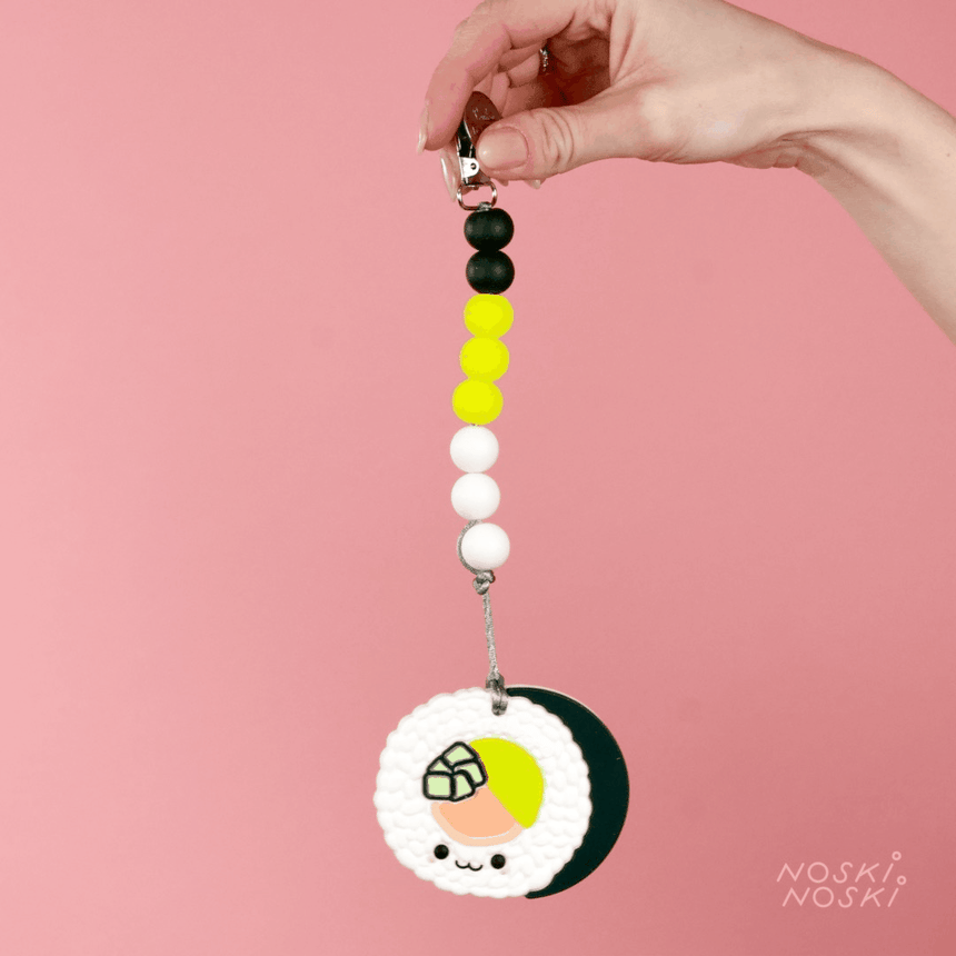 Loulou Lollipop: gryzak silikonowy z zawieszką Sushi Roll - Noski Noski