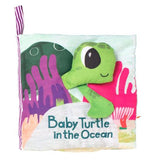 Manhattan Toy: miękka książeczka aktywnościowa żółwik Baby Turtle - Noski Noski