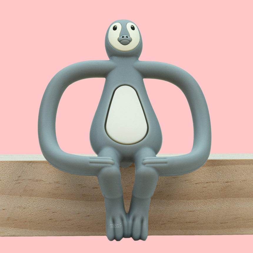 Gryzak dla niemowlaka Matchstick Monkey Polo Penguin, silikonowy i antybakteryjny, łagodzi ból dziąseł podczas ząbkowania.