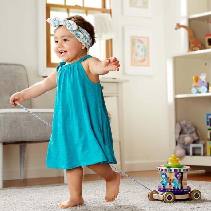 Melissa and Doug: drewniana karuzela do ciągnięcia - Noski Noski