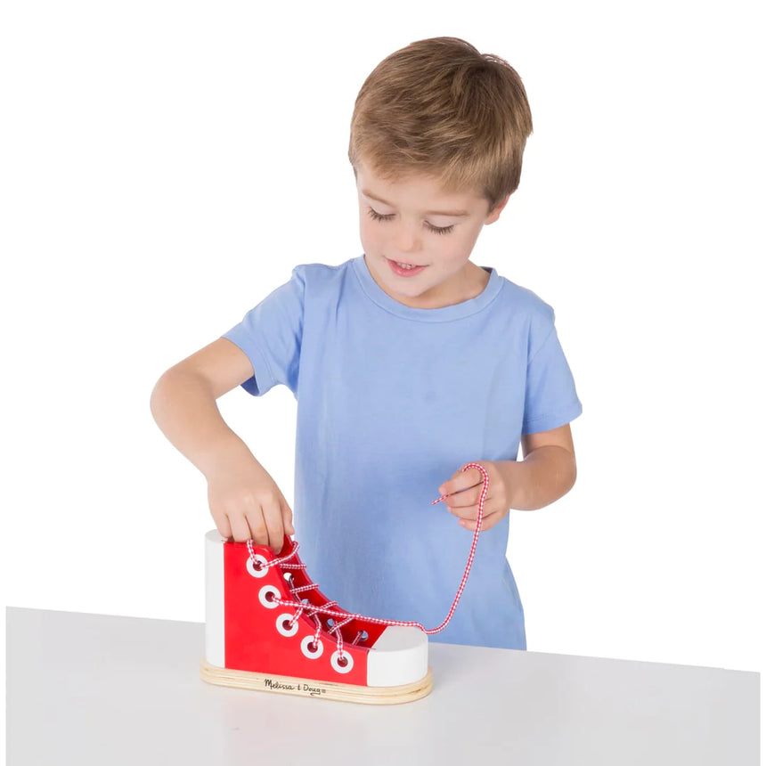 Melissa and Doug: drewniany but do nauki sznurowania Wooden Lacing Shoe - Noski Noski