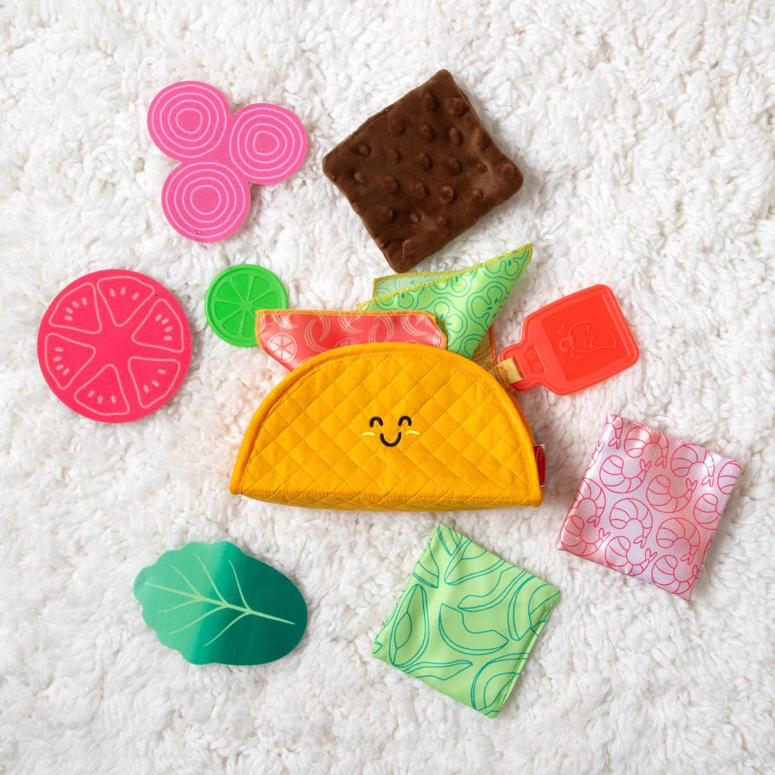 Melissa and Doug: zabawka sensoryczna dla niemowląt Soft Taco Fill & Spill - Noski Noski