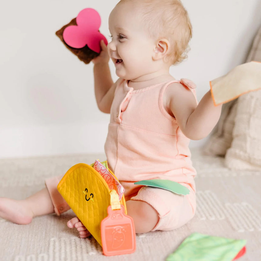 Melissa and Doug: zabawka sensoryczna dla niemowląt Soft Taco Fill & Spill - Noski Noski