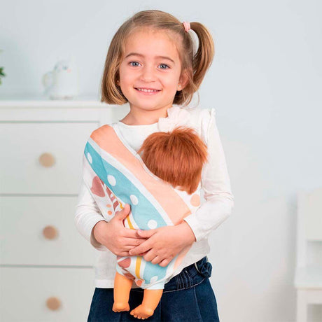 Nosidełko dla lalek Miniland, miękkie i wygodne nosidełko-chusta na jedno ramię, idealne do lalek 38 cm.