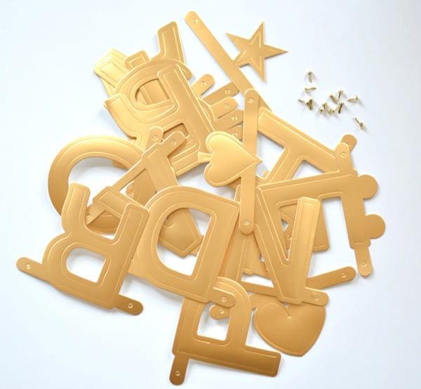 OMM Design: złoty baner literowy - Noski Noski
