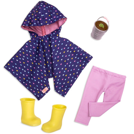 Żółte kalosze dla lalki Barbie Our Generation, idealne na deszczowe dni, w zestawie z pelerynką, różowymi spodniami i wiaderkiem.